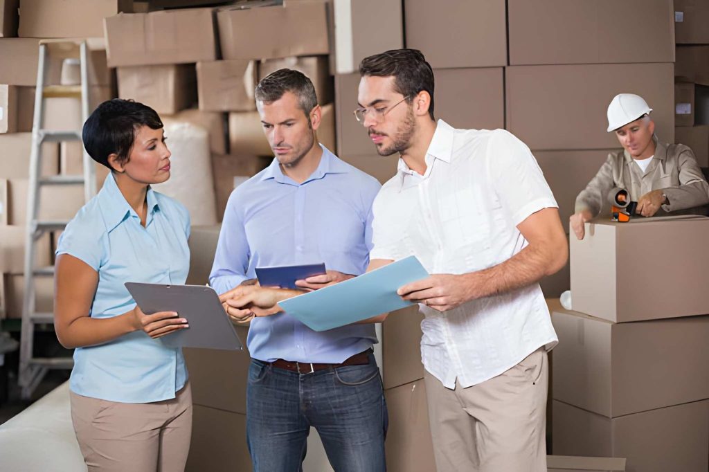 Staff reviewing shipment proposals to compare top freight forwarders in India
