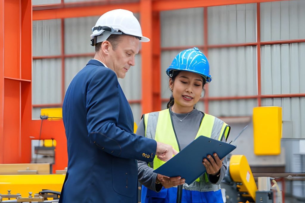 Logistics staff checking shipping instructions for ocean freight booking